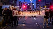 Cartaz no protesto em Nuremberg, que ocorreu no último domingo, 19 - Getty Images